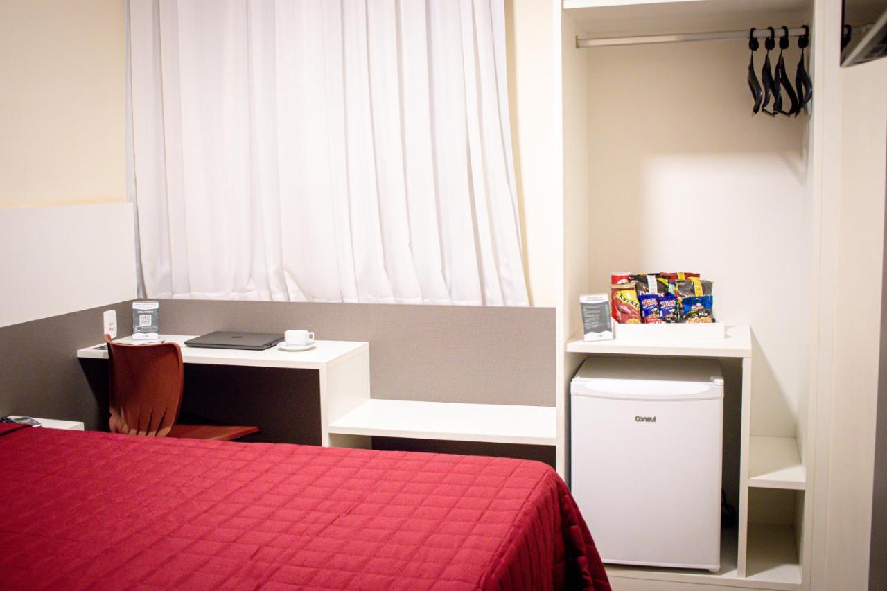 Hotel H2 Congonhas Экстерьер фото A typical room at a capsule hotel