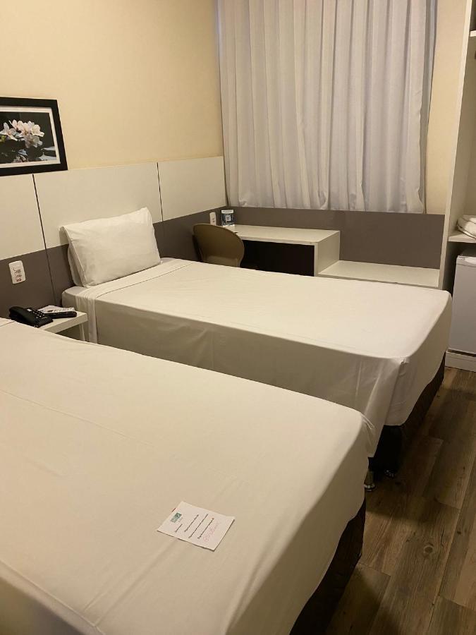 Hotel H2 Congonhas Экстерьер фото A single bed